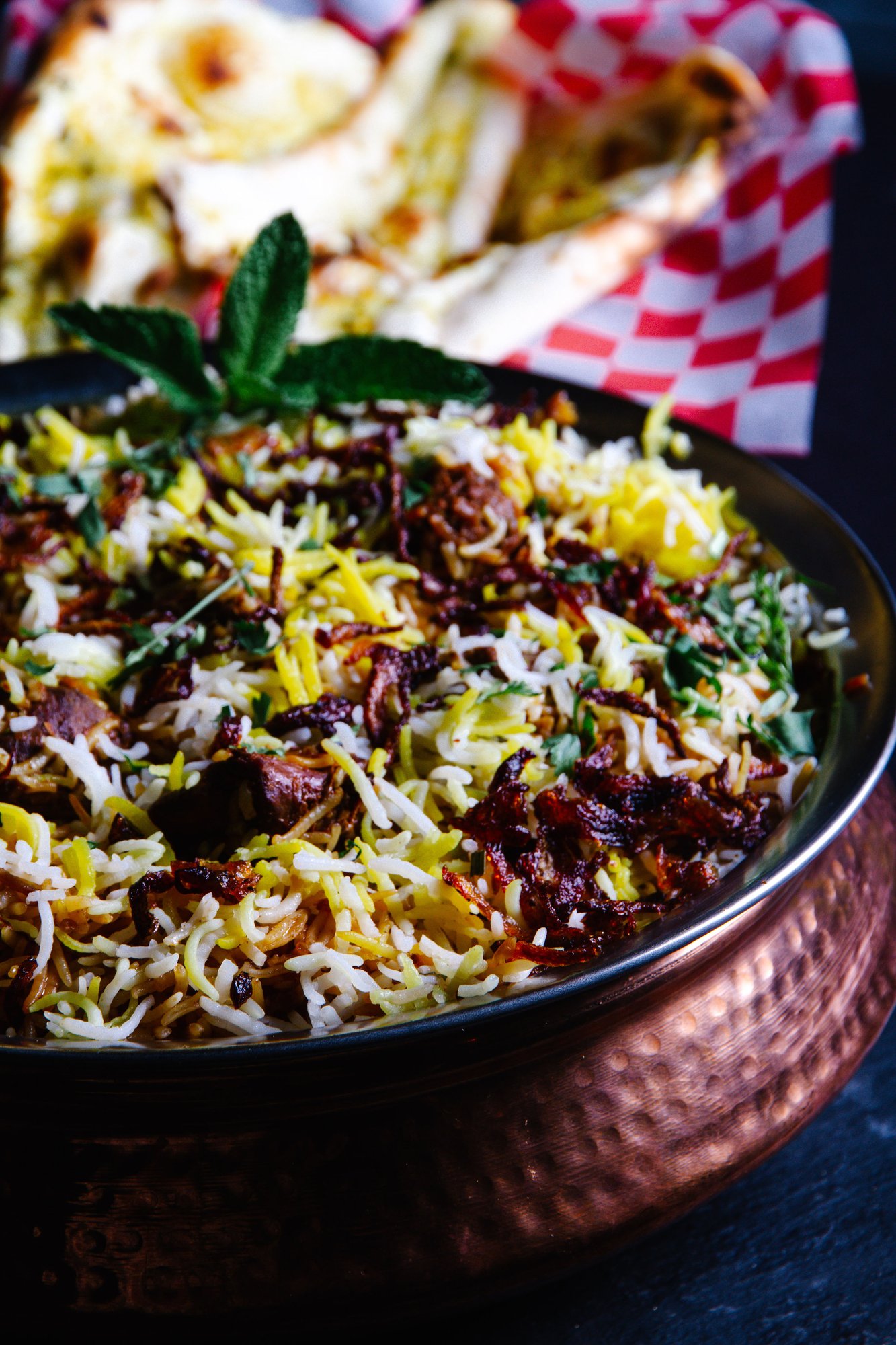 Family pack spread - mutton biryani with chicken 65 and naan